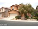 Attractive home with a two-car garage and a well-manicured front yard with green shrubs at 6528 Chebec St, North Las Vegas, NV 89084