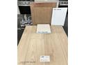 Showcasing kitchen material samples including cabinets, paint, quartz countertop, vinyl plank flooring and chrome faucet at 10032 Indy Rey Ct, Las Vegas, NV 89148