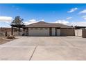 Charming single-story home featuring a three-car garage and neutral color scheme at 1988 N Moapa Valley Blvd, Logandale, NV 89021