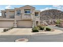 Charming two-story home with a two-car garage and well-maintained landscaping at 234 Priority Point St, Henderson, NV 89012