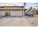 Charming two-story townhome with a two-car garage and desert landscaping at 3939 Jontue St, Las Vegas, NV 89115