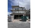 New two-story home with scaffolding, showcasing a modern design and construction progress at 9076 Rivington Ave, Las Vegas, NV 89148