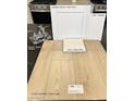 Interior design selection featuring Elkins White cabinets, Alabaster paint, and Silver Dollar luxury vinyl plank flooring at 9076 Rivington Ave, Las Vegas, NV 89148