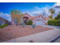 Charming single-story home featuring desert landscaping and a two-car garage at 1309 Misty View Ct, North Las Vegas, NV 89031