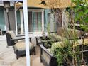 Cozy covered patio area with comfortable seating and outdoor decor at 1812 Ivanhoe Way, Las Vegas, NV 89102