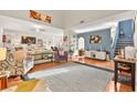 Bright living room with vaulted ceilings, hardwood floors, and stylish decor at 262 Cielito Lindo St, Henderson, NV 89012