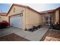 Exterior view showing the home's facade, garage, walkway, and gate-enclosed front yard at 2905 Gentilly Ln, Las Vegas, NV 89108