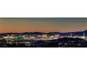 Sweeping twilight view of the Las Vegas Strip with the city skyline and distant mountains at 4 Dry Brook Trl, Henderson, NV 89052