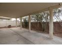 Large, covered patio with ample space for outdoor entertaining and a well-maintained garden at 4804 Portola Vista Ave, Las Vegas, NV 89139