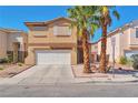 Charming two-story home with a well-maintained front yard and two palm trees at 9614 Orchard Oasis Ct, Las Vegas, NV 89147