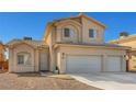 Two story home with a three-car garage and light tan exterior at 2435 Paddock Ln, Las Vegas, NV 89156