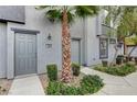 Inviting front entrance with well-maintained landscaping and a charming walkway at 9050 W Tropicana Ave # 1080, Las Vegas, NV 89147