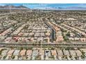 Expansive aerial view of a residential community near Downtown Summerlin and Red Rock Casino & Resort at 10808 Wallflower Ave, Las Vegas, NV 89135