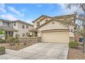 Charming two-story home featuring desert landscaping and a spacious two car garage at 10808 Wallflower Ave, Las Vegas, NV 89135