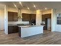 Spacious kitchen with stainless steel appliances, granite countertops, and a large island at 12434 Parkscene Pl, Las Vegas, NV 89138