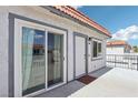 Condo exterior boasting a private entry, sliding glass door, and access to the patio at 1101 Willow Tree Dr # D, Las Vegas, NV 89128