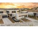 Stunning modern house with desert landscaping in a beautiful location surrounded by mountains at 12 Falling Canyon Ct, Henderson, NV 89011
