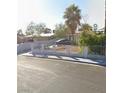 Single-story home with a fence, front yard, and a driveway at 1804 David Ave, Las Vegas, NV 89101