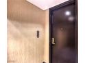 Clean hallway area outside a condo with a modern door and electronic lock at 4381 W Flamingo Rd # 2308, Las Vegas, NV 89103