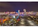 Breathtaking night view of the Las Vegas skyline highlighting the vibrant city lights and iconic landmarks at 4381 W Flamingo Rd # 2308, Las Vegas, NV 89103