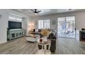 Comfortable living room with a sliding glass door to the outdoor patio at 8073 Villa Pulido St, Las Vegas, NV 89131