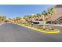 Welcome to Indigo, featuring community sign, landscaping, and palm trees at 9323 Best Ct, Las Vegas, NV 89178