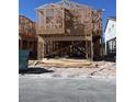 New construction home shows the framing with wooden beams in a modern design at 9070 Rivington Ave, Las Vegas, NV 89148