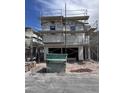 New construction home shows a two-story residence with scaffolding awaiting completion at 9070 Rivington Ave, Las Vegas, NV 89148