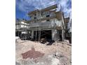 New construction home featuring scaffolding and a modern architectural design under a sunny sky at 9070 Rivington Ave, Las Vegas, NV 89148