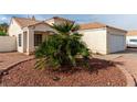 Charming single-story home with a well-manicured front yard and a two-car garage at 436 Pumpkin Way, Henderson, NV 89015