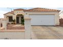 Inviting single-story home with attached two-car garage and neutral stucco facade at 436 Pumpkin Way, Henderson, NV 89015