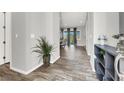 Modern entryway with a view of the dining room and hardwood floors throughout at 8245 Broad Branch Way, Las Vegas, NV 89113