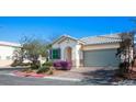 Lovely single-story home with a well manicured front yard and brick paved driveway at 4032 Little Bay Ave, North Las Vegas, NV 89081
