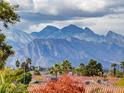 Scenic view of snow-capped mountains from the property overlooking treetops at 209 Tainted Berry Ave, North Las Vegas, NV 89031