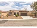 Attractive single-story home with desert landscaping and a welcoming entrance at 2605 Memphis Ave, Henderson, NV 89052