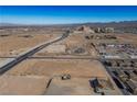This aerial view shows the property situated near residential development and city amenities at 3900 W Landberg Ave, Las Vegas, NV 89141