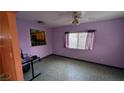 Versatile room with ceiling fan, window, and access to the kitchen at 5268 Gains Mill St, Las Vegas, NV 89122