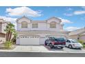Charming two-story home with a tile roof, three-car garage, and well-maintained landscaping at 5331 Heatherbrook Cir, Las Vegas, NV 89120
