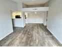 Open-concept living room with neutral paint and modern flooring at 7885 W Flamingo Rd # 2153, Las Vegas, NV 89147