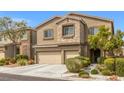 Attractive two-story house boasting a two-car garage and inviting curb appeal at 9144 Irish Elk Ave, Las Vegas, NV 89149