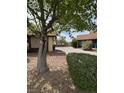Cozy home featuring mature trees and low-maintenance desert landscaping at , Las Vegas, NV 89102