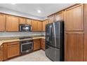 Well-equipped kitchen with stainless steel appliances and granite countertops at 11408 Newton Commons Dr # 104, Las Vegas, NV 89135
