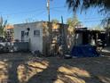 The backyard has equipment and other items and a shed at 2520 Sunrise St, Las Vegas, NV 89101