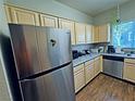 Functional kitchen featuring stainless steel appliances, granite countertops, and ample cabinet space at 5250 S Rainbow Blvd # 1131, Las Vegas, NV 89118