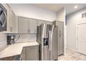 Kitchen featuring stainless steel refrigerator and light gray cabinets and counters at 6437 Wide Sky St, Las Vegas, NV 89166