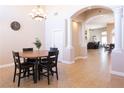 A dining area showcasing decorative pillars, an inviting layout and easy access to other living spaces at 6493 Yellow Bells Ct, Las Vegas, NV 89131