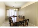 Formal dining room featuring a large table and stylish chandelier at 7549 Evening Falls Dr Dr, Las Vegas, NV 89131