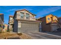 Well-maintained two-story home with a large two-car garage, neutral-toned stucco, and a tile roof at 8532 Caddy Corner St, Las Vegas, NV 89139