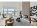 Bright and spacious living room with modern fireplace, decor, and ample natural light at 916 Pro Players Dr, Las Vegas, NV 89134