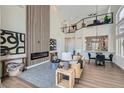 Expansive living area with fireplace, open floor plan, and modern design elements at 916 Pro Players Dr, Las Vegas, NV 89134
